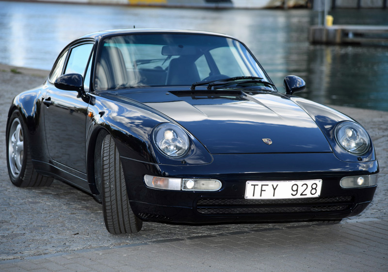 Mörkblå metallic Porsche 911/ 993 Carrera 4 stulen i Stockholm