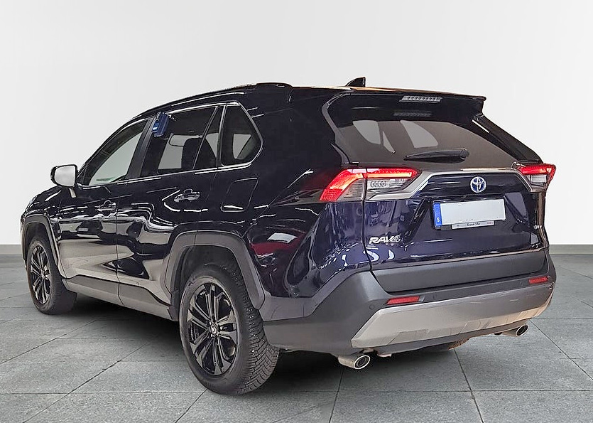 Mörkblå Toyota RAV4 Hybrid AWD-i 2,5 Executive stulen i Ensta, Täby norr om Stockholm