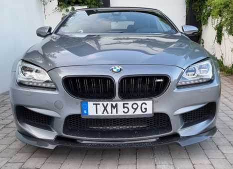 Grå BMW M6 Cab stulen i Täby