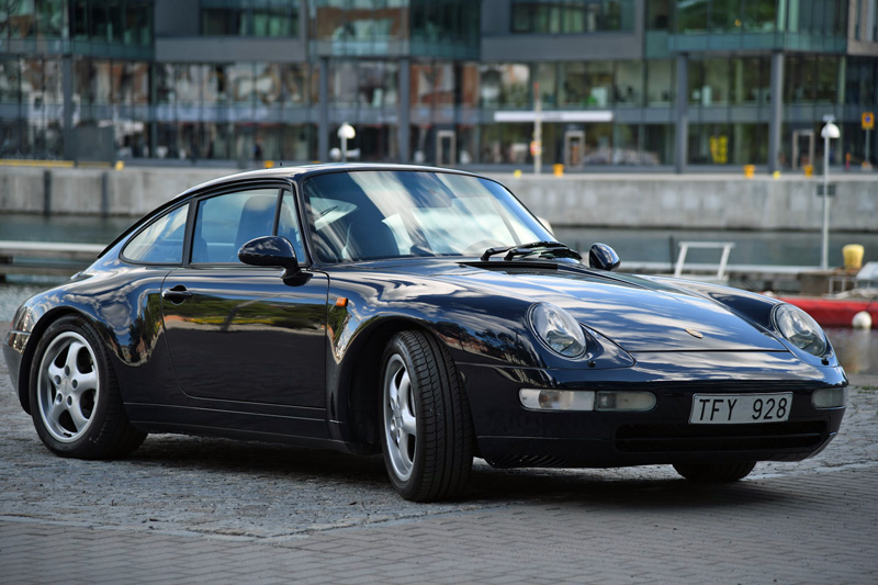 Mörkblå metallic Porsche 911/ 993 Carrera 4 stulen i Stockholm