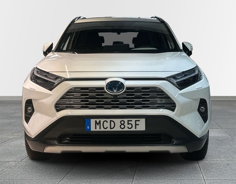 Vit Toyota RAV4 Hybrid AWD Executive stulen på Södermalm i Stockholm