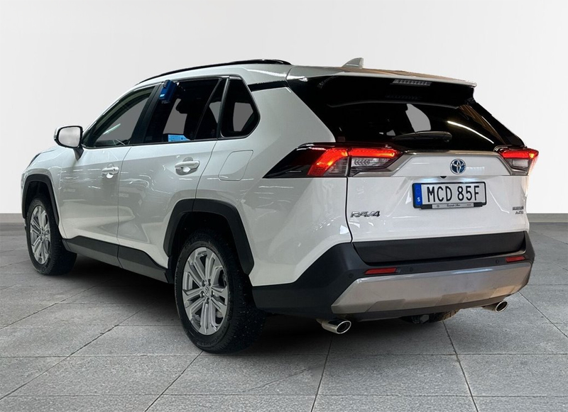 Vit Toyota RAV4 Hybrid AWD Executive stulen på Södermalm i Stockholm