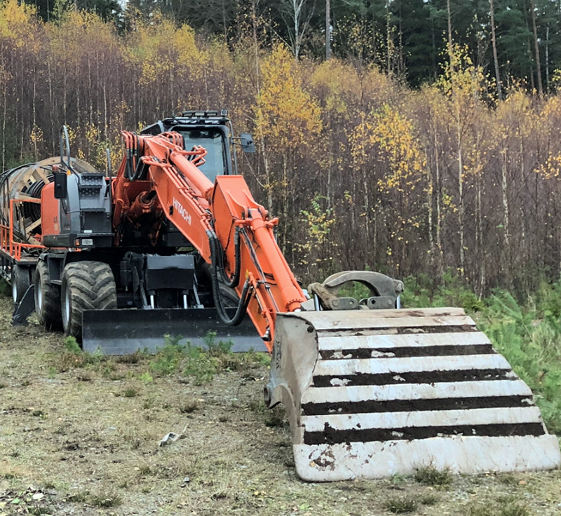 Hjulburen grävmaskin Hitachi Zaxis 170 W stulen mellan Gislaved och Sjötofta