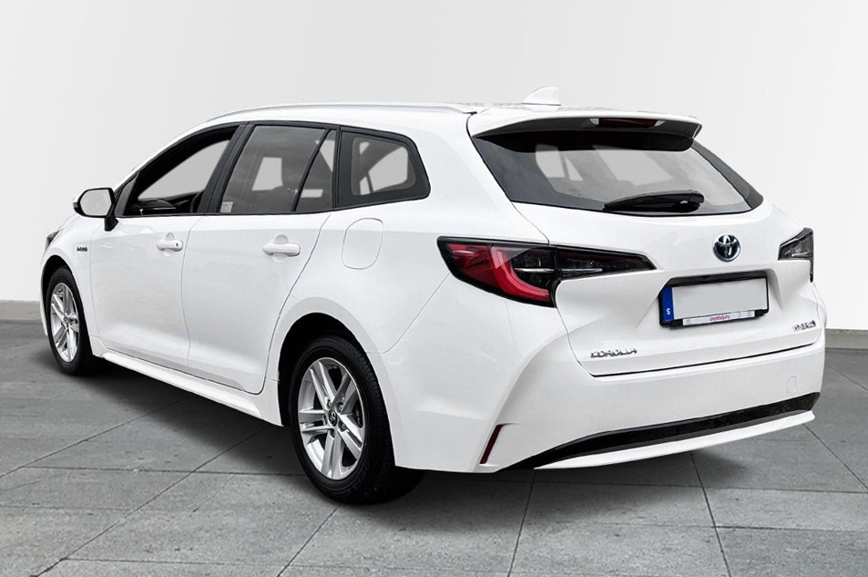 Vit Toyota Corolla Touring Sports Hybrid stulen i Solna