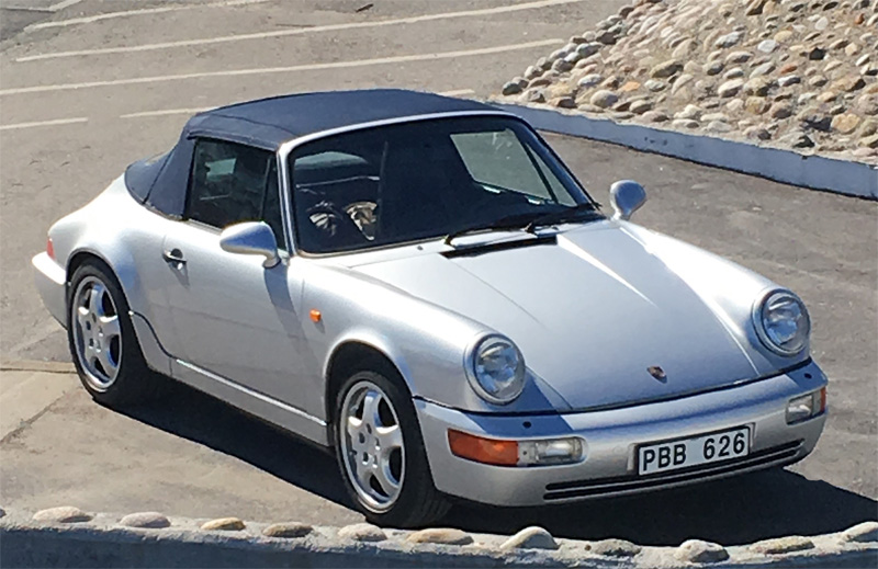 Silvermetallic Porsche 911/ 964 Carrera 4 Cabriolet stulen på Östermalm i Stockholm