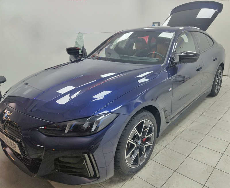 Blå BMW I4 M50 Xdrive stulen i Enskede, Stockholm