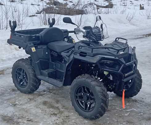 Svart fyrhjuling Polaris Sportsman 570 X2 stulen norr om Norsjö