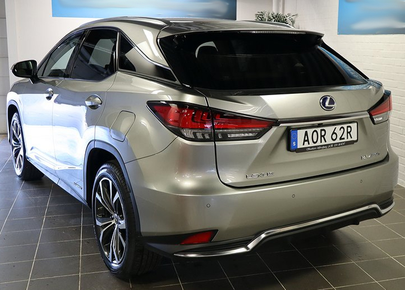 Ljusgrå metallic Lexus RX450H AWD Executive stulen i Rönninge sydväst om Stockholm