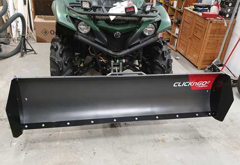 Grön Yamaha YFM 700 EPS Grizzly med Kimpex plog stulen i Hakkas