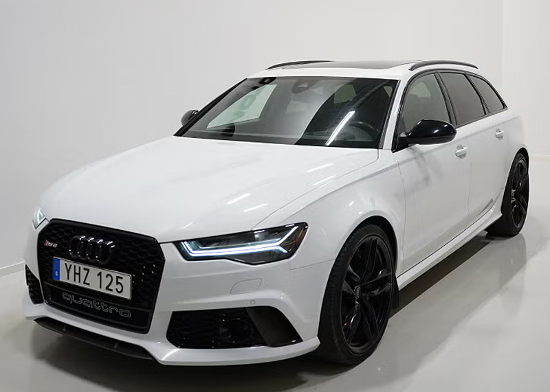 Vit  Audi RS6 Avant Performance Quattro stulen vid provkörning i Knivsta