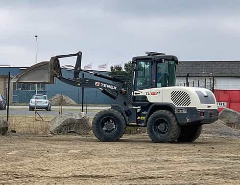 957701