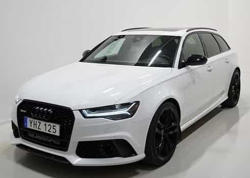 Vit  Audi RS6 Avant Performance Quattro stulen vid provkörning i Knivsta